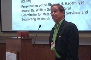 Dr. Lynn "Nick" Shay accepting the Richard Hagemeyer Award